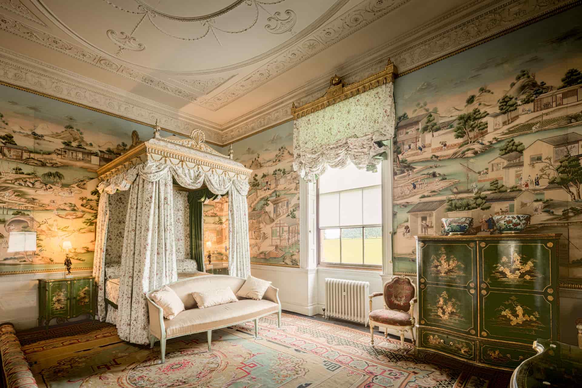 Bedroom interior with a plain ceiling above the bed