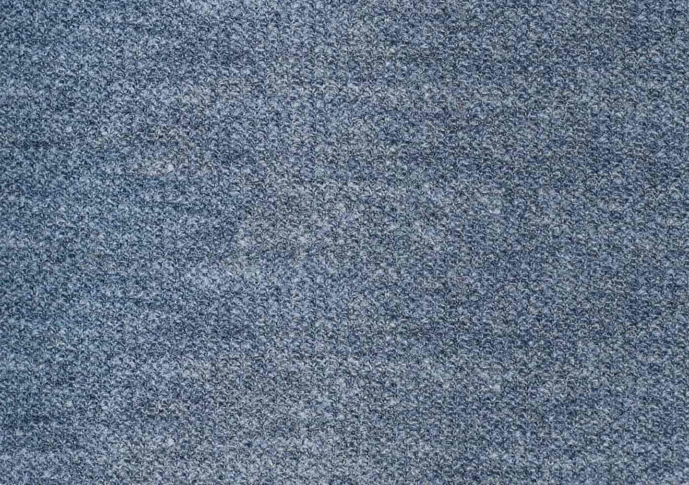Close detail of woven fire-resistant fabric under raking light