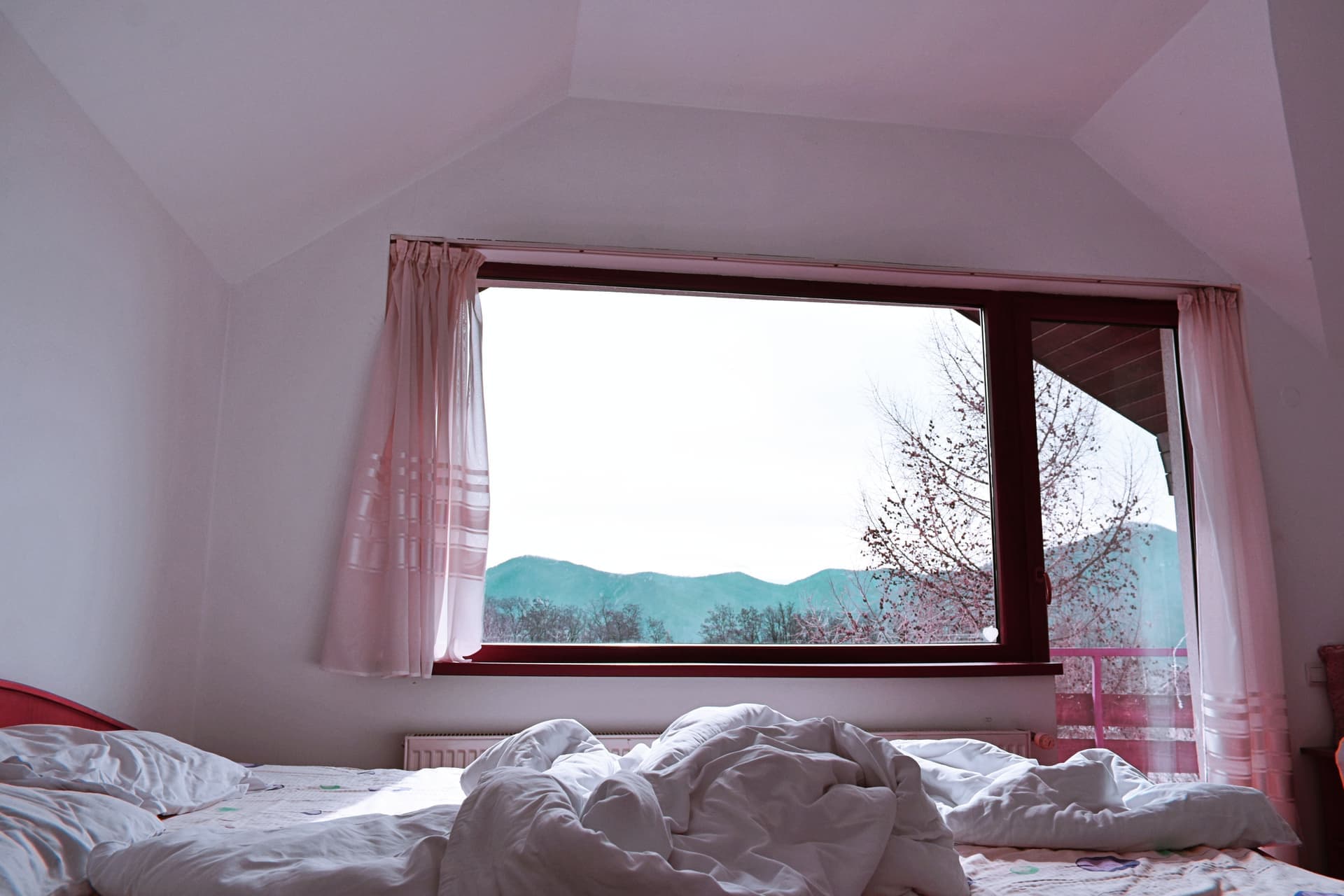Upstairs bedroom window with a clear sill in daylight