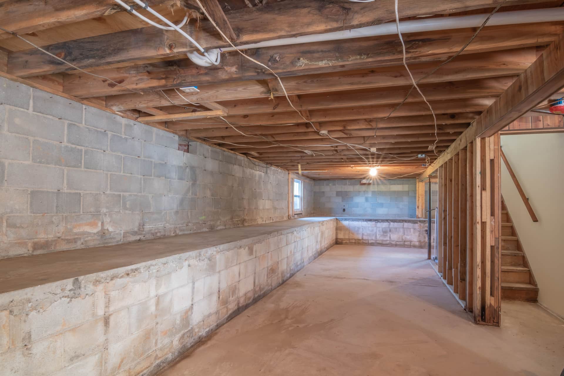 Basement room with a window high on the wall